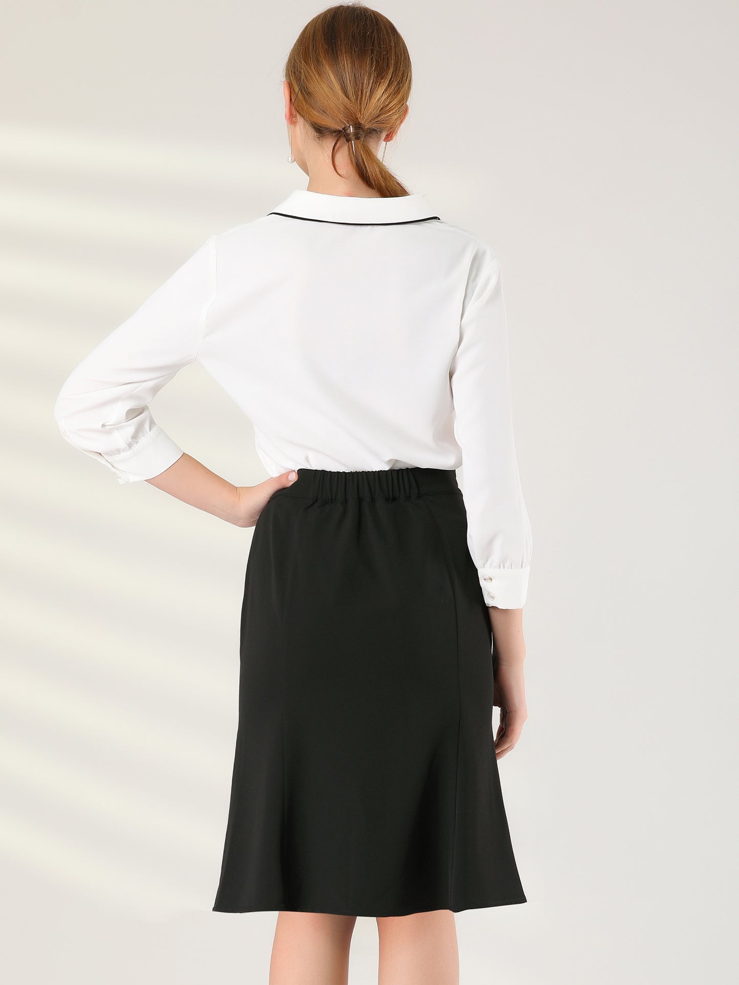 Falda de oficina con abertura y cintura elástica con botones decorativos para mujer
