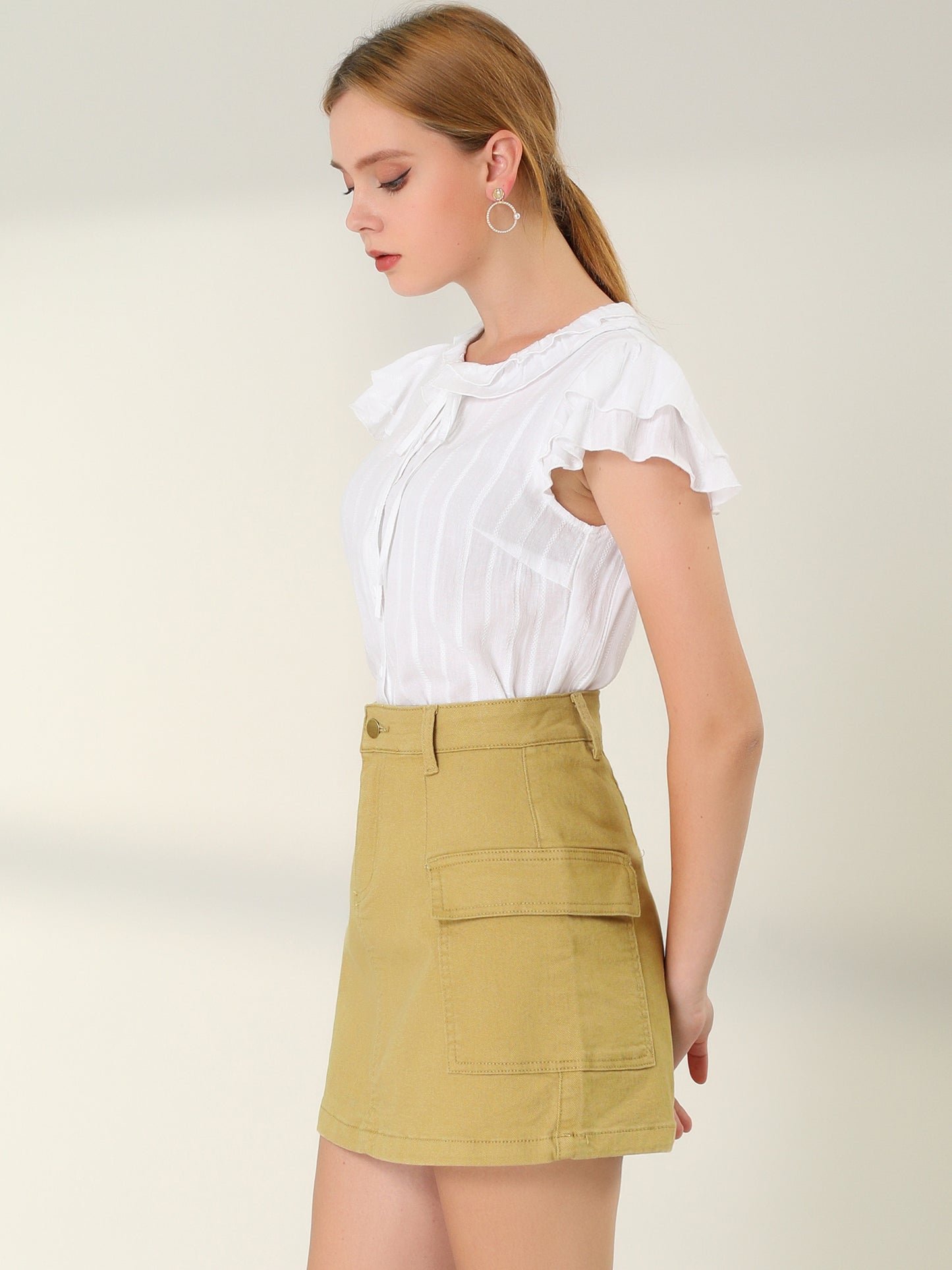 Falda vaquera corta con cintura alta y bolsillos con solapa para mujer