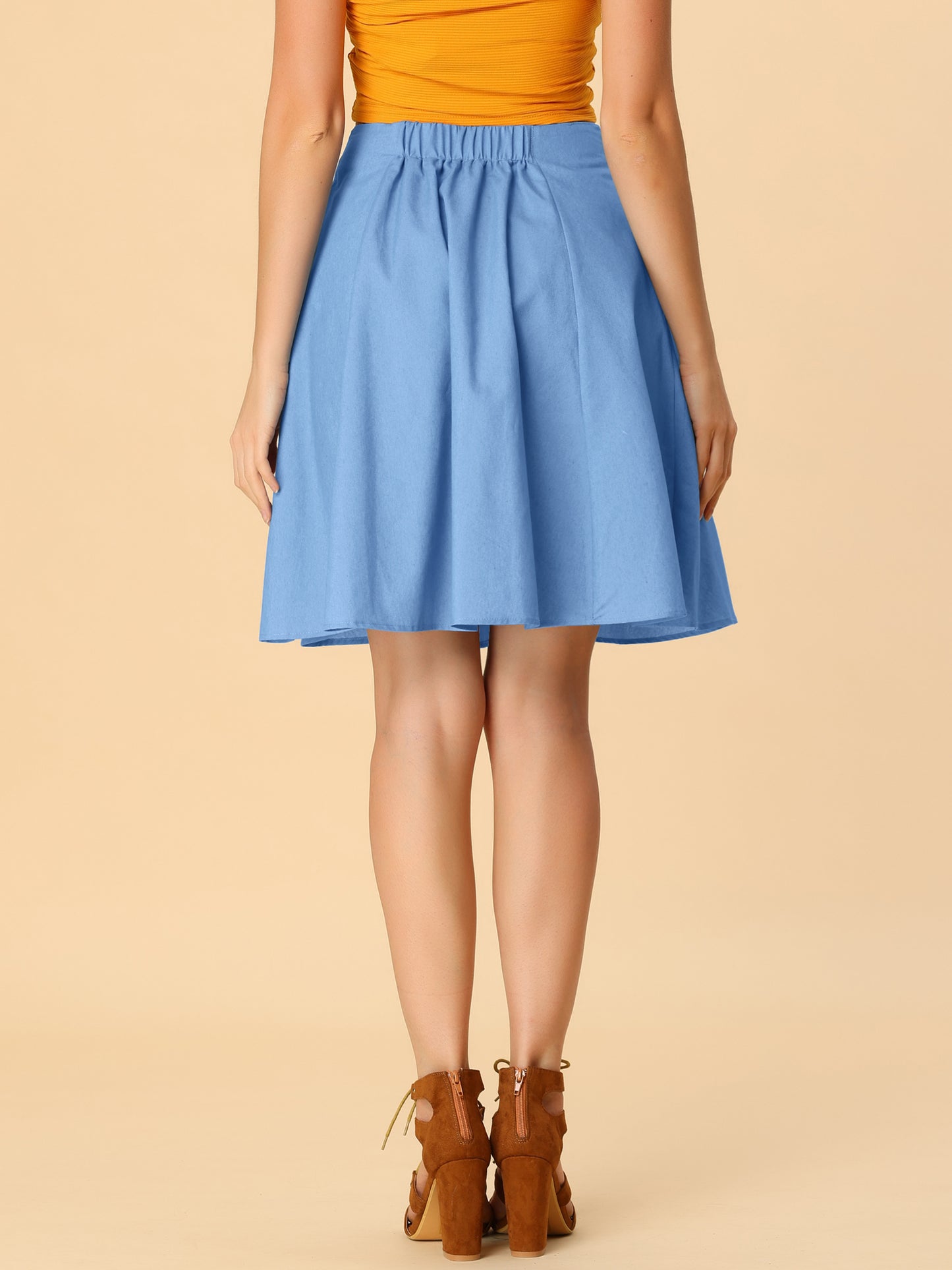 Falda vaquera de mujer con cordones y corte cambray hasta la rodilla