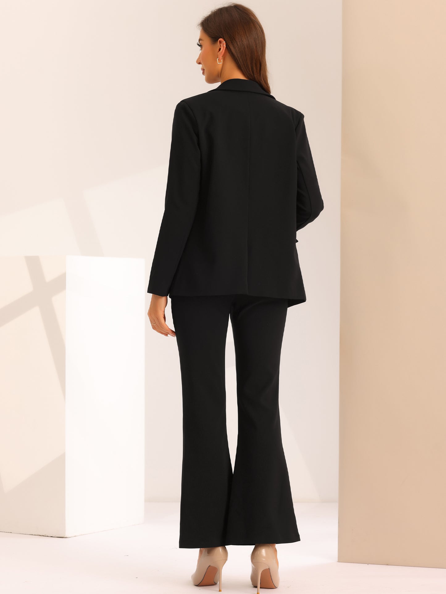Traje de trabajo formal de dos piezas para mujer, conjunto de blazer y pantalón cruzado.
