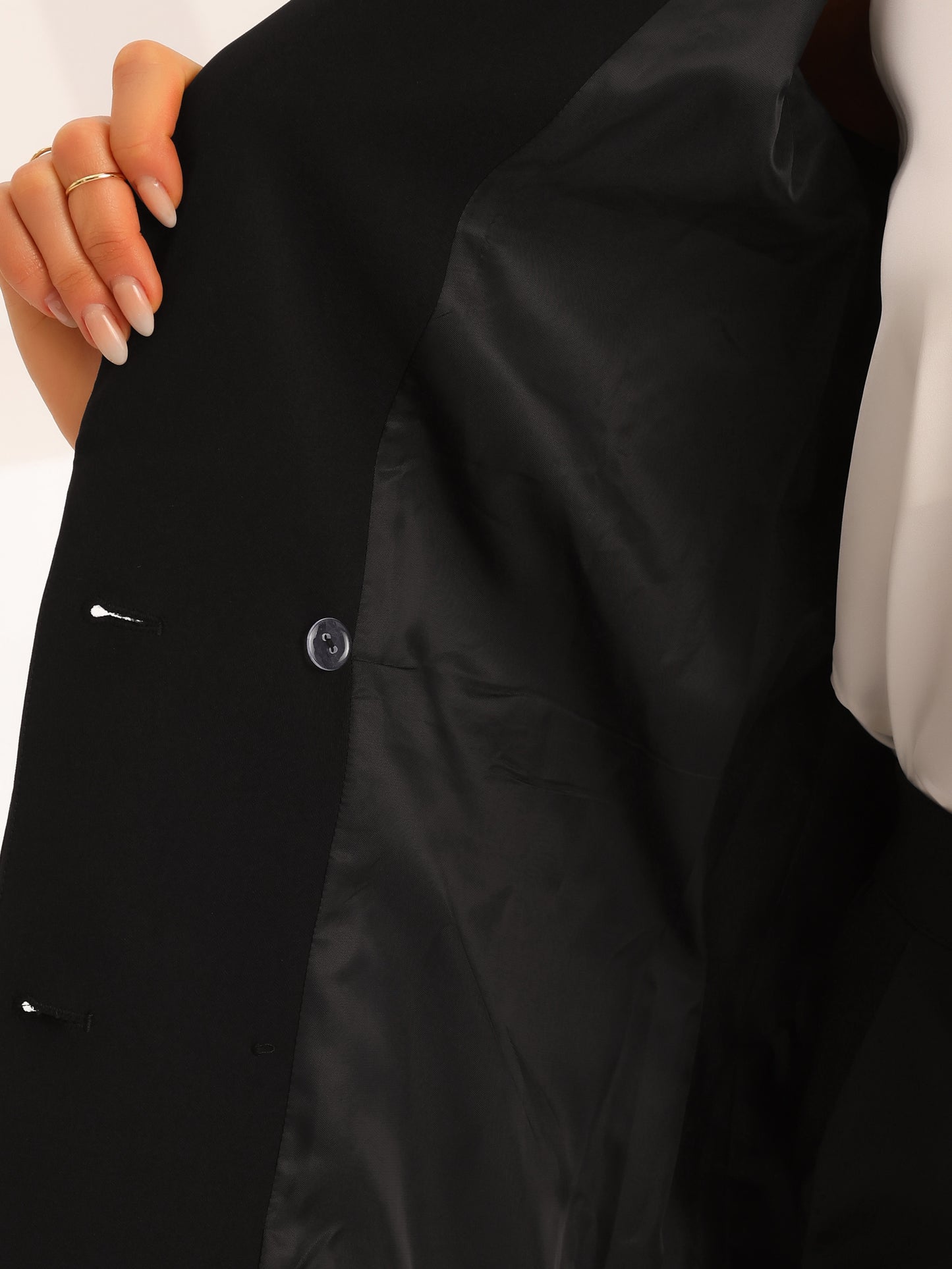 Traje de trabajo formal de dos piezas para mujer, conjunto de blazer y pantalón cruzado.