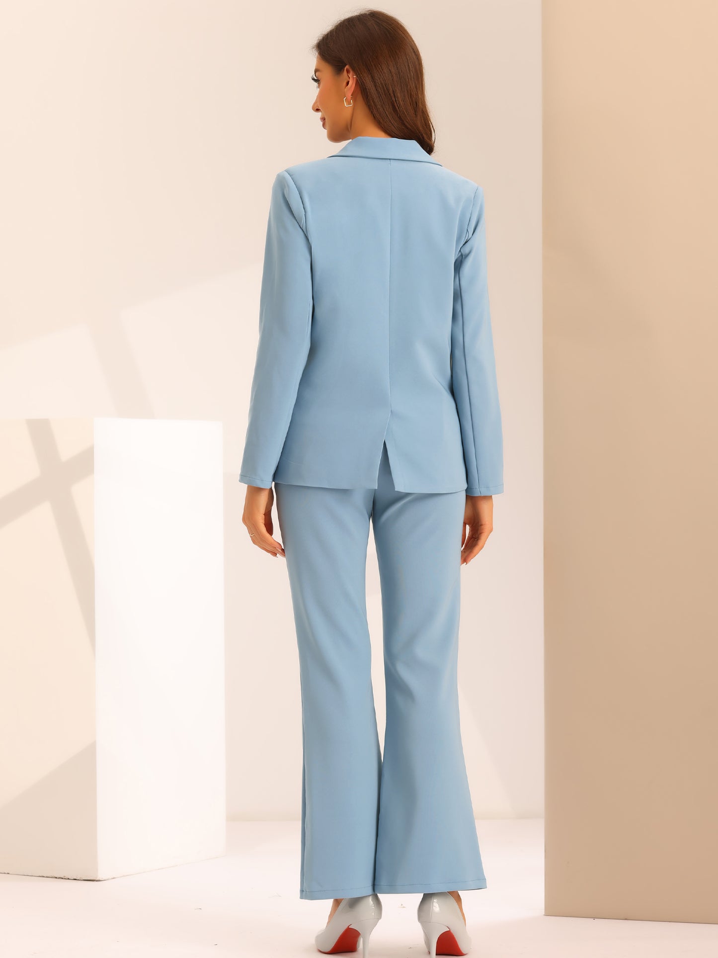 Traje de trabajo formal de dos piezas para mujer, conjunto de blazer y pantalón cruzado.