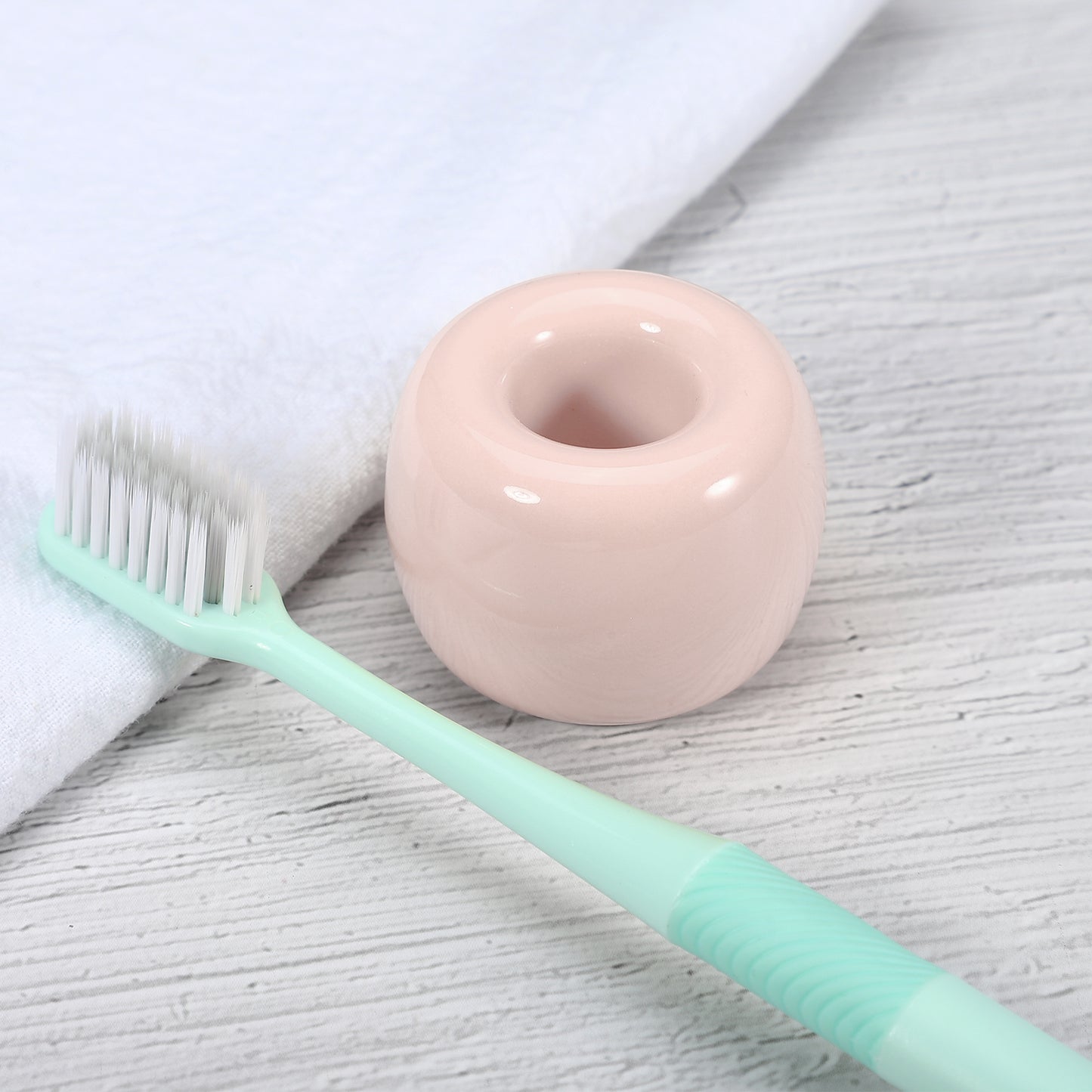 Mini portacepillos de dientes redondo de cerámica para baño, 4,25 x 3 cm, color rosa