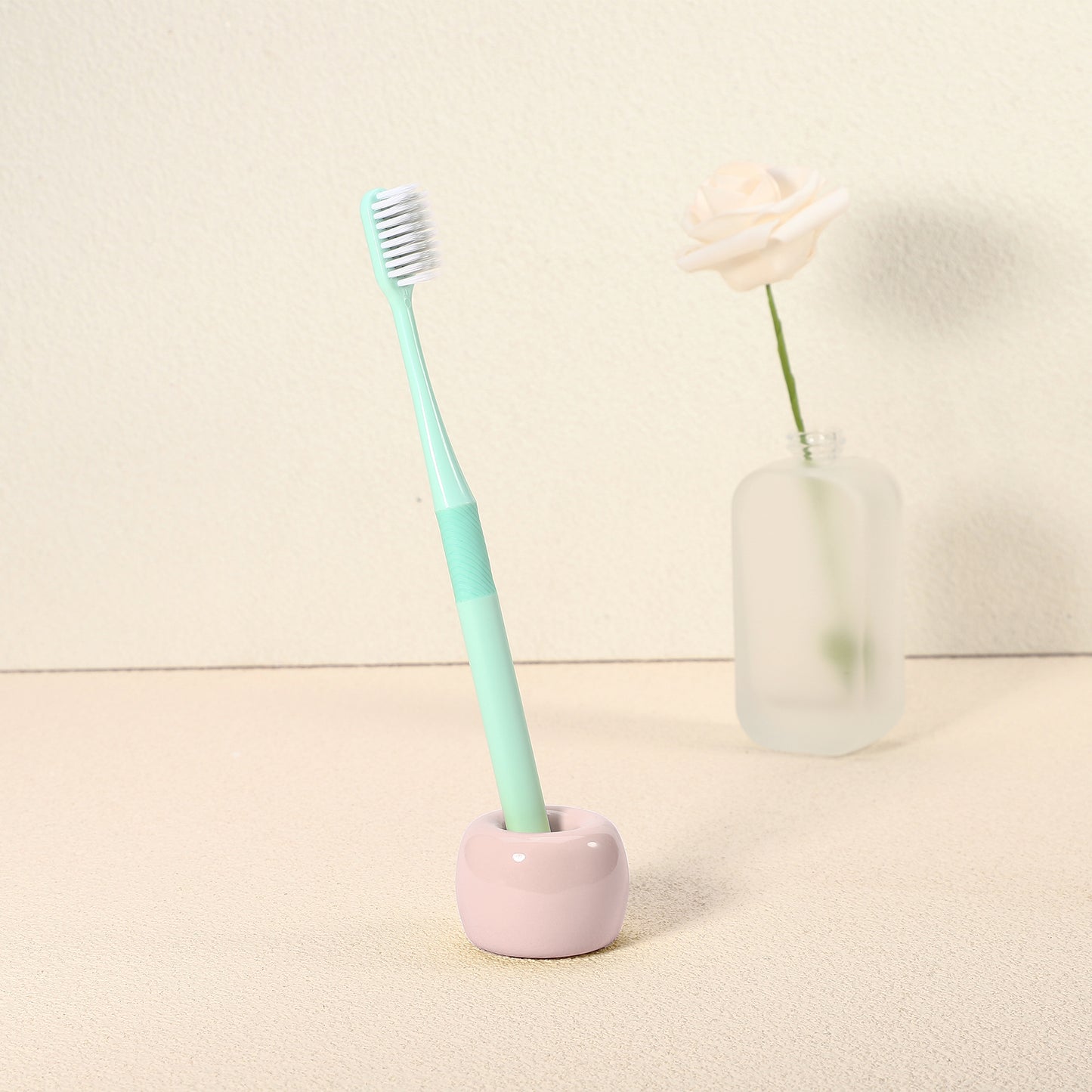 Mini portacepillos de dientes redondo de cerámica para baño, 4,25 x 3 cm, color rosa