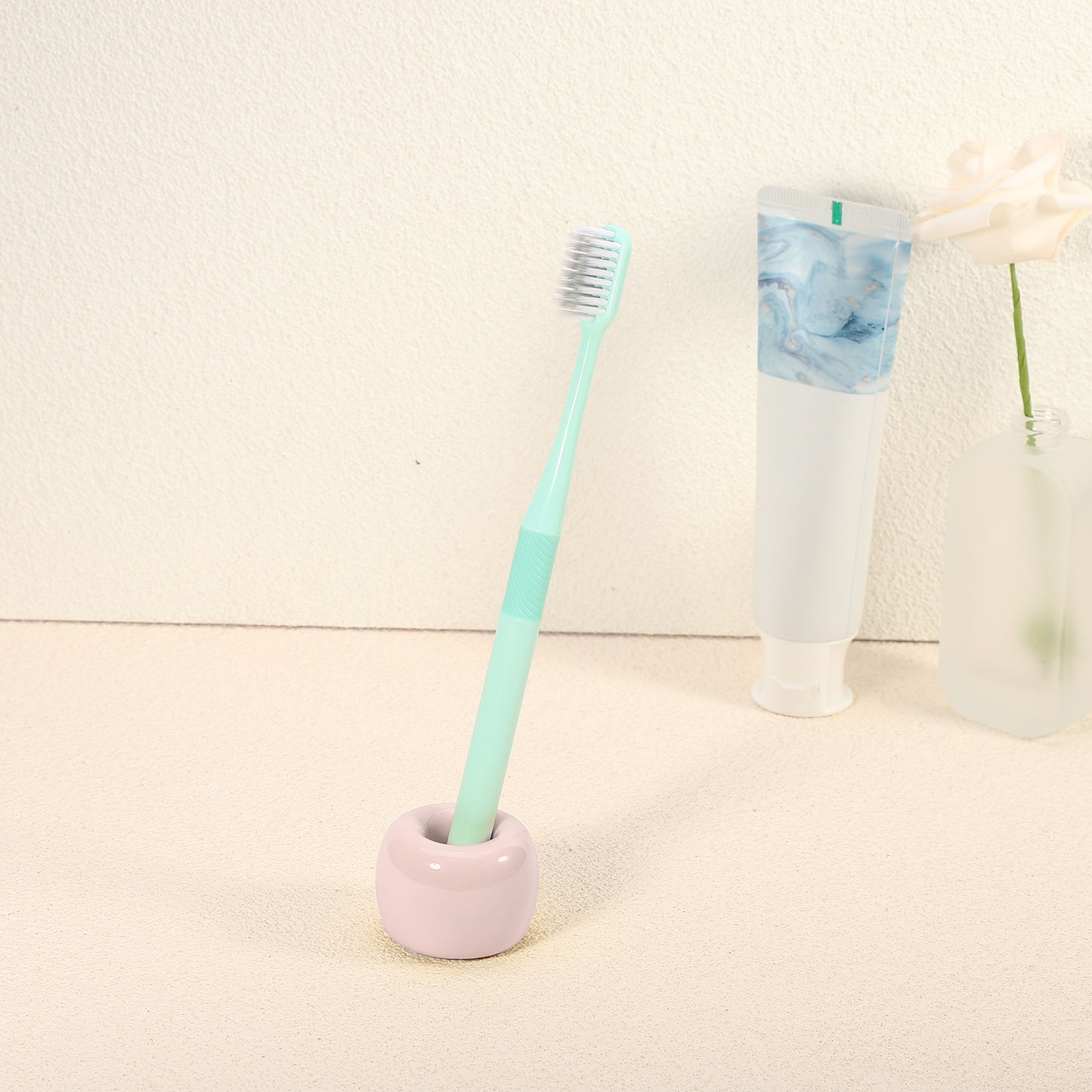 Mini portacepillos de dientes redondo de cerámica para baño, 4,25 x 3 cm, color rosa