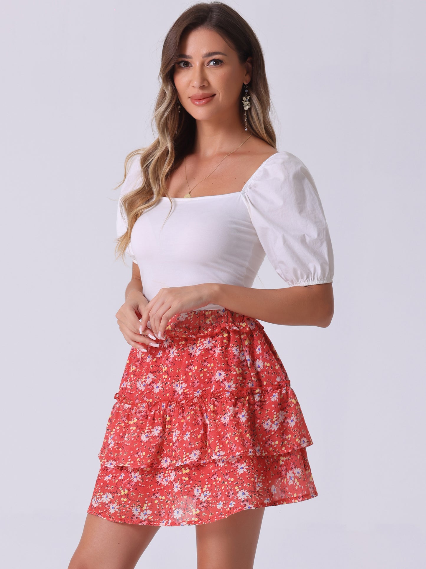 Minifalda skater floral con cintura elástica y dobladillo con volantes en capas para mujer
