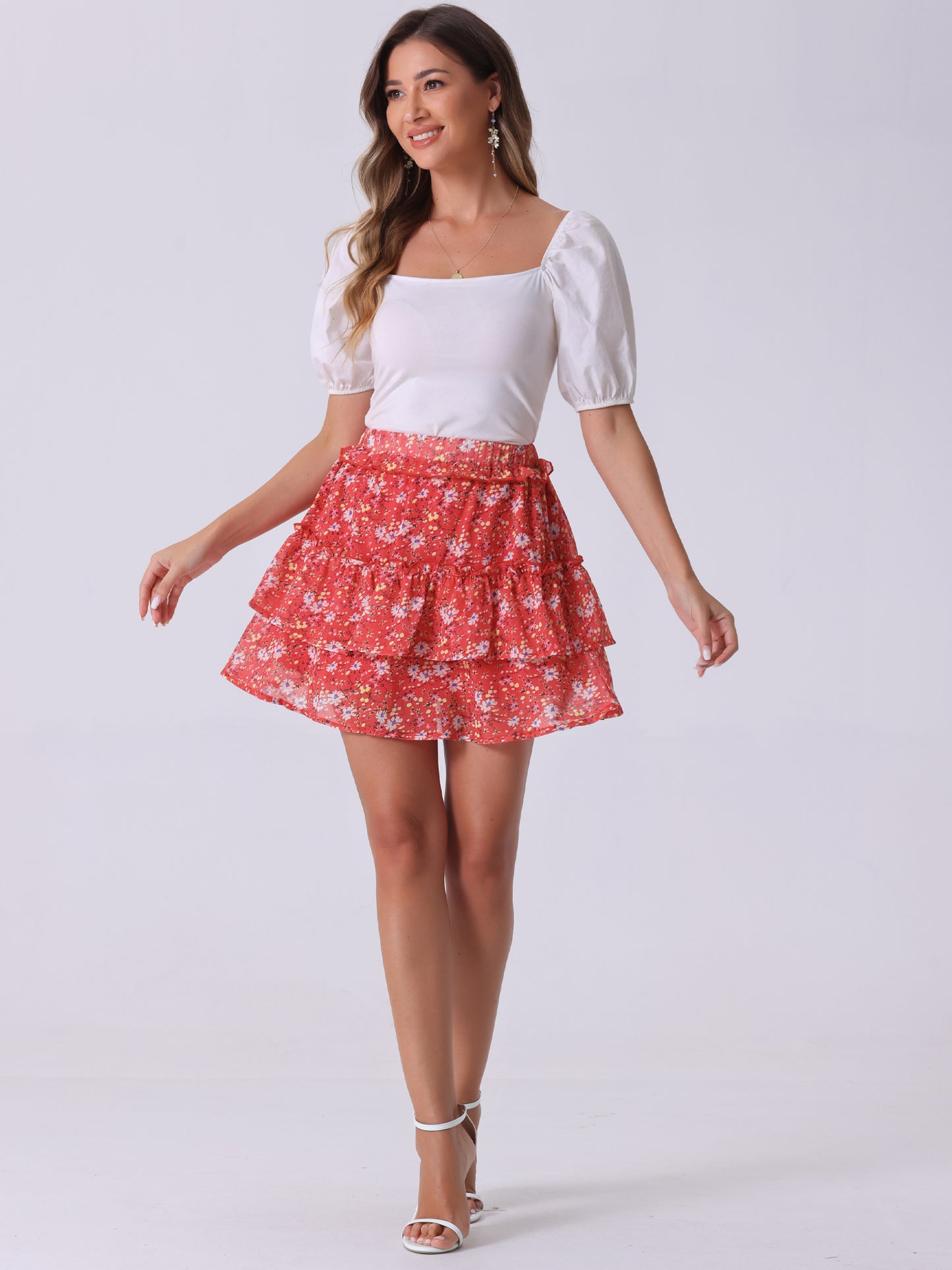 Minifalda skater floral con cintura elástica y dobladillo con volantes en capas para mujer