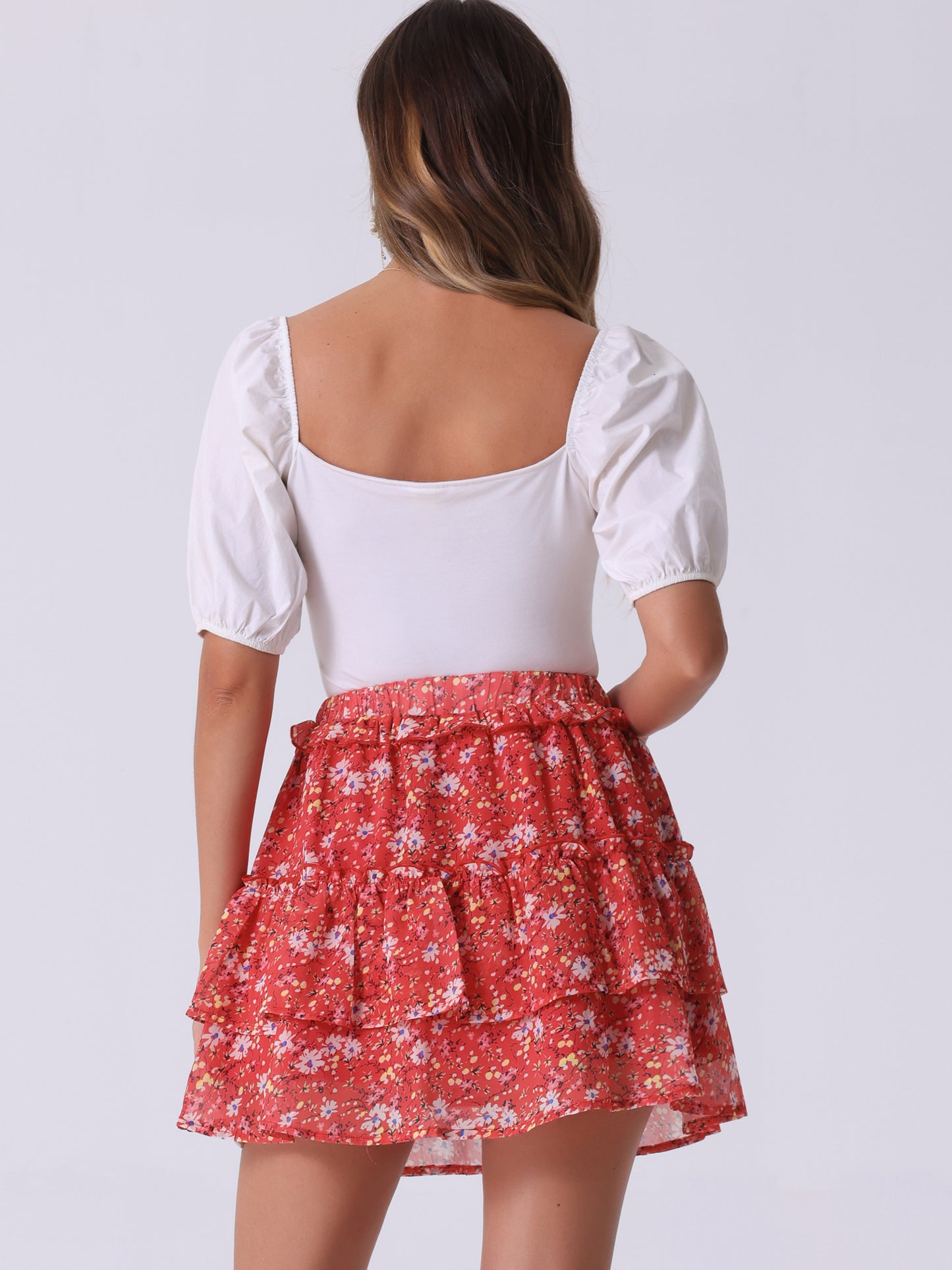 Minifalda skater floral con cintura elástica y dobladillo con volantes en capas para mujer