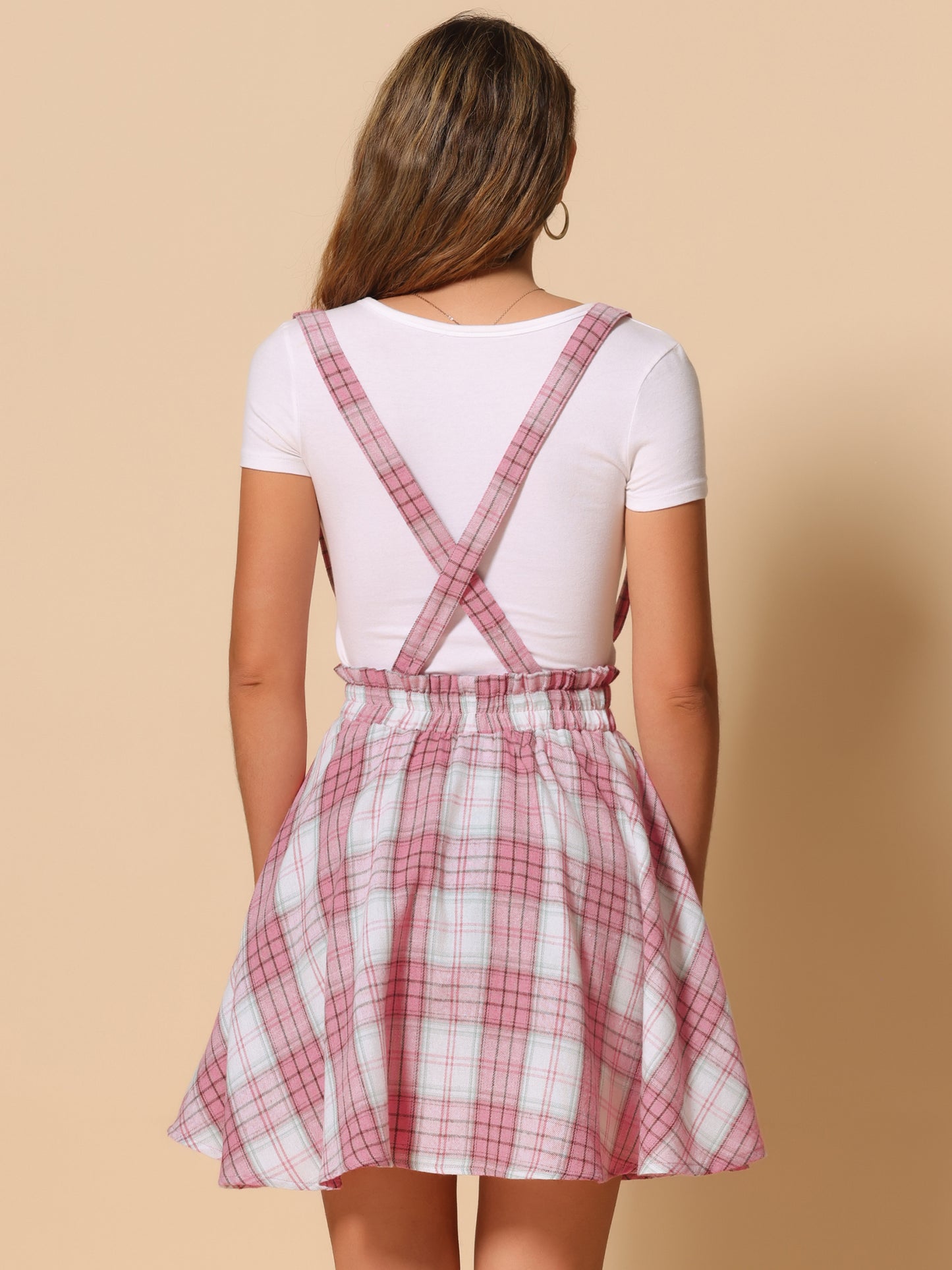 Falda skater acampanada con tirantes y botones decorados con cuadros escoceses para mujer
