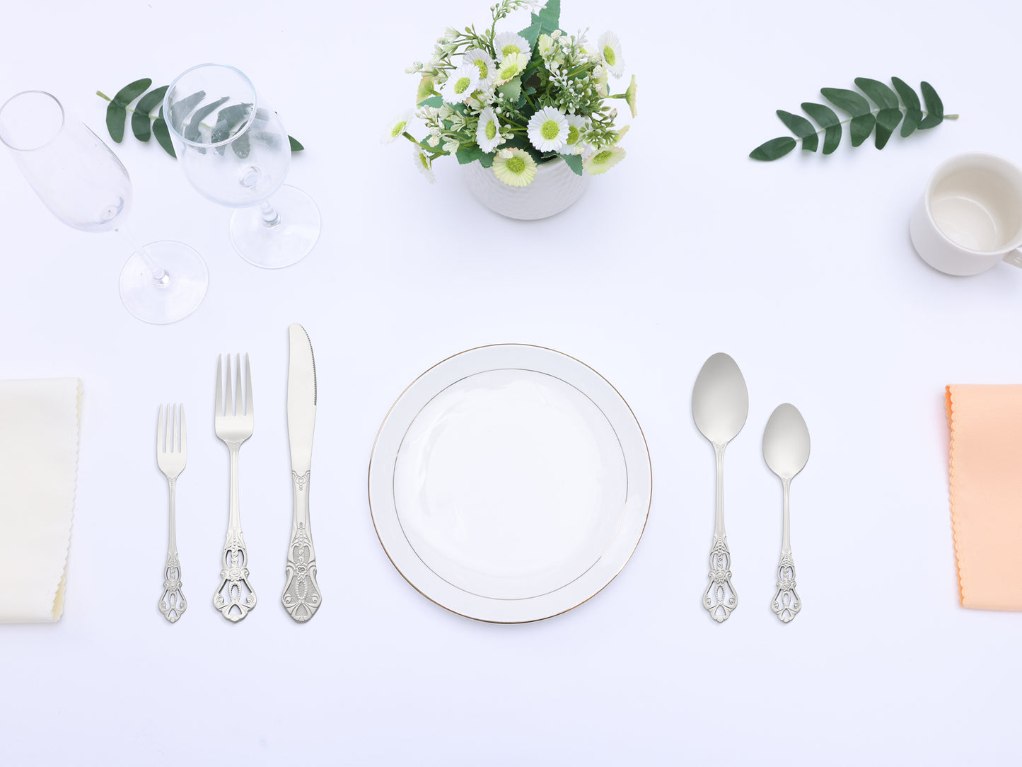 Juego de cubiertos de acero inoxidable de 20 piezas con diseño floral, moderno.