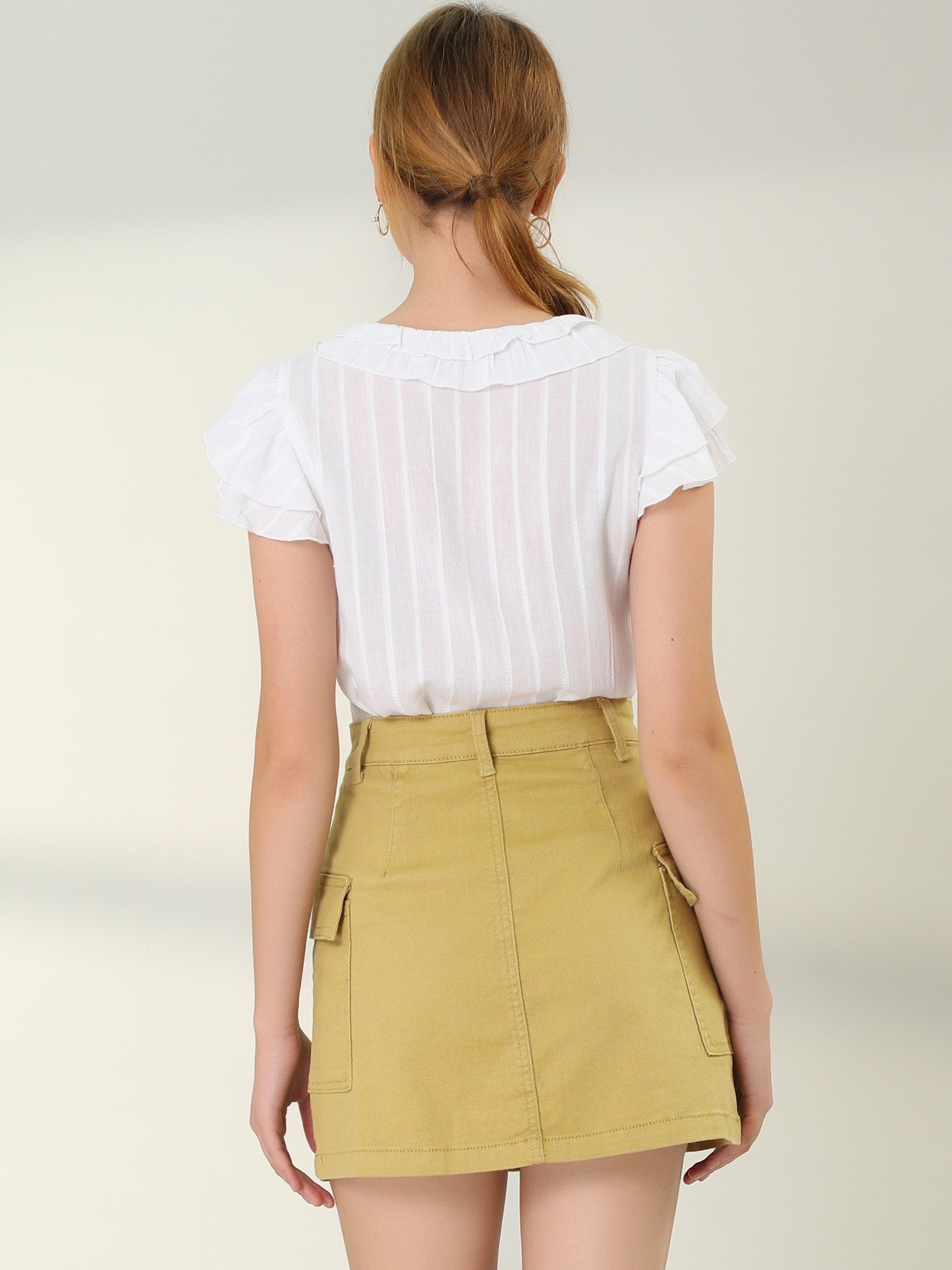 Falda vaquera corta con cintura alta y bolsillos con solapa para mujer