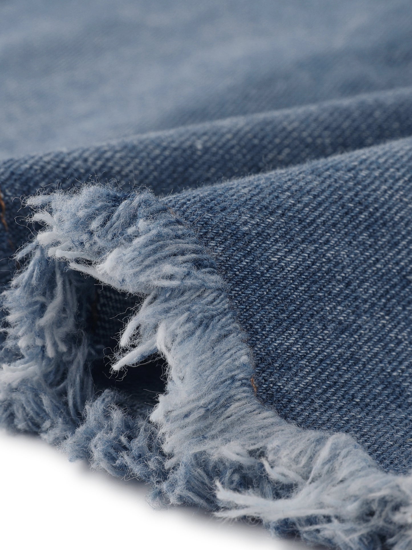 Faldas vaqueras de mujer con dobladillo sin rematar y botones.