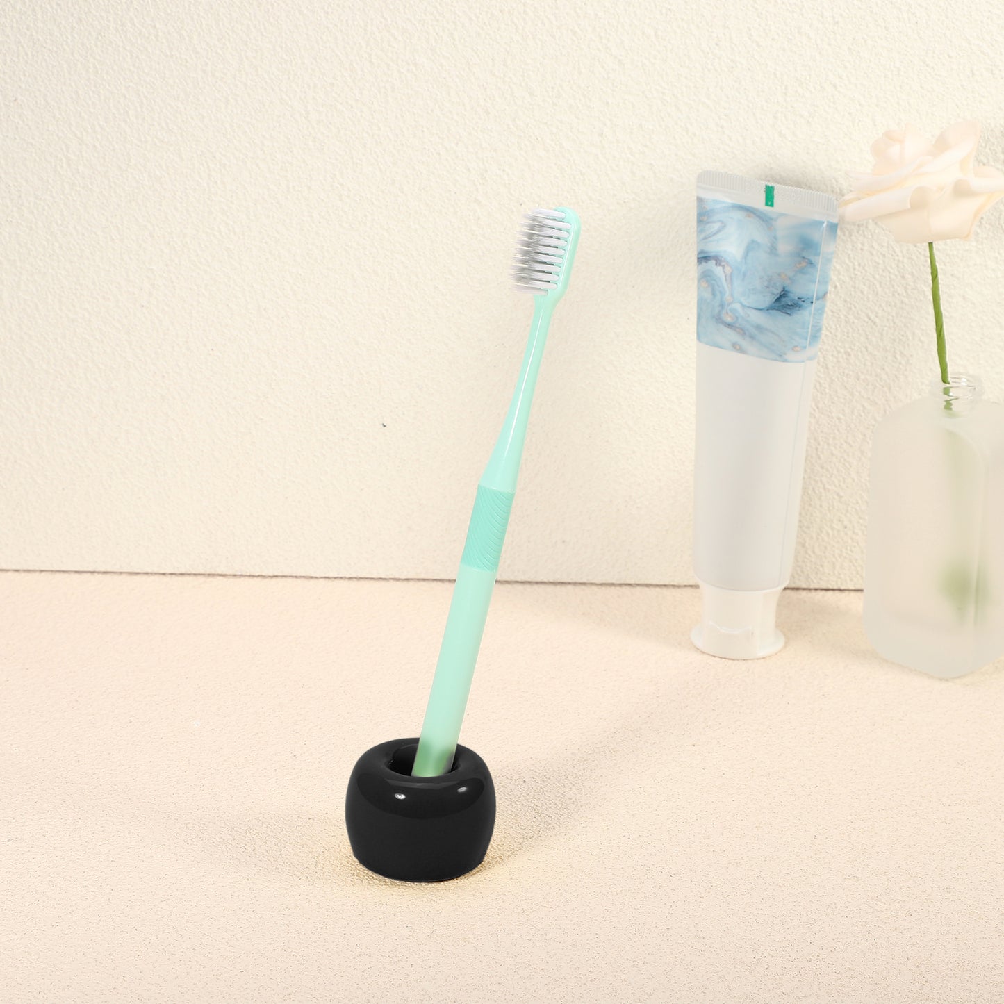 Mini portacepillos de dientes redondo de cerámica para baño, 4,2 x 3 cm, color negro