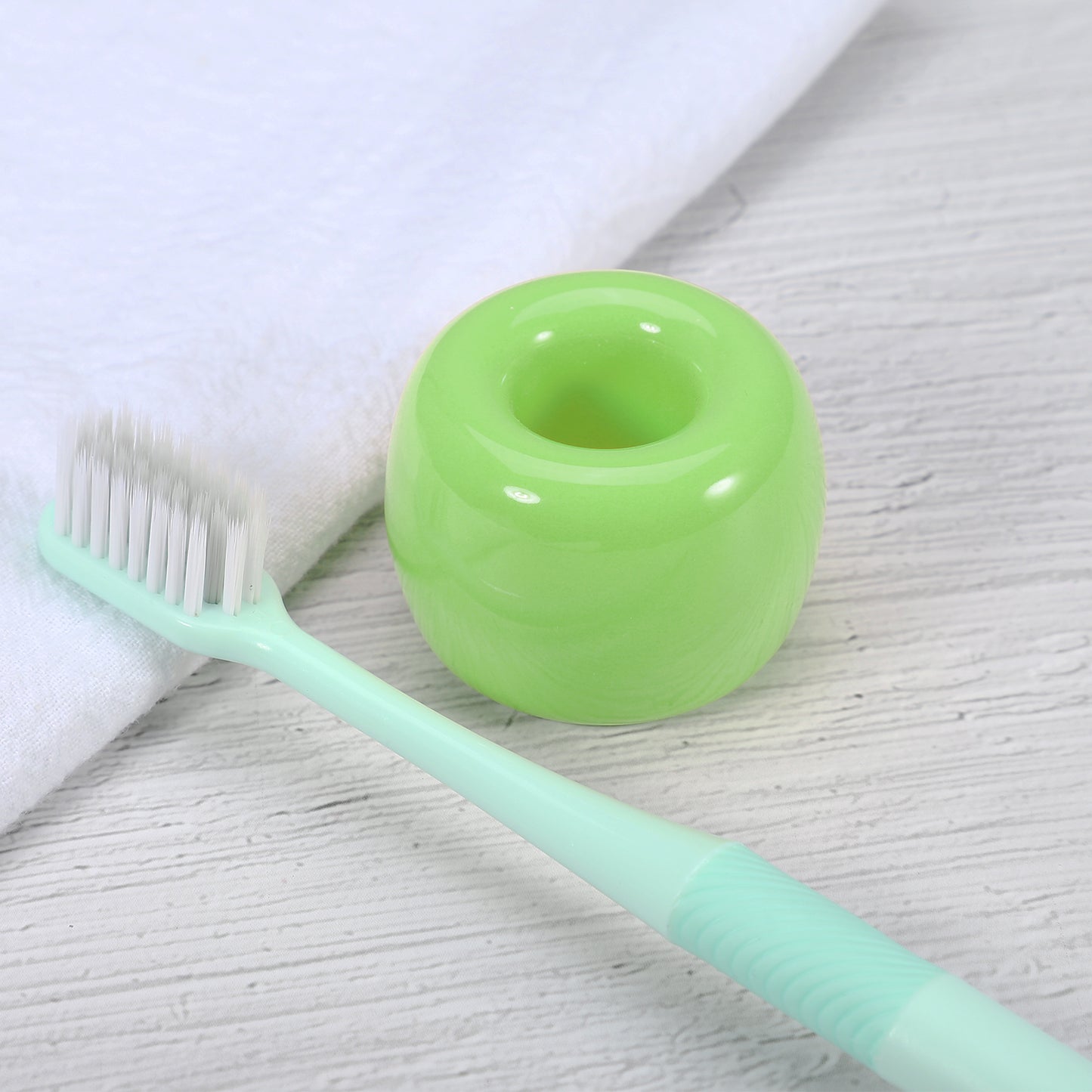Mini portacepillos de cerámica redondo para baño, 4,25 x 3 cm, color verde claro