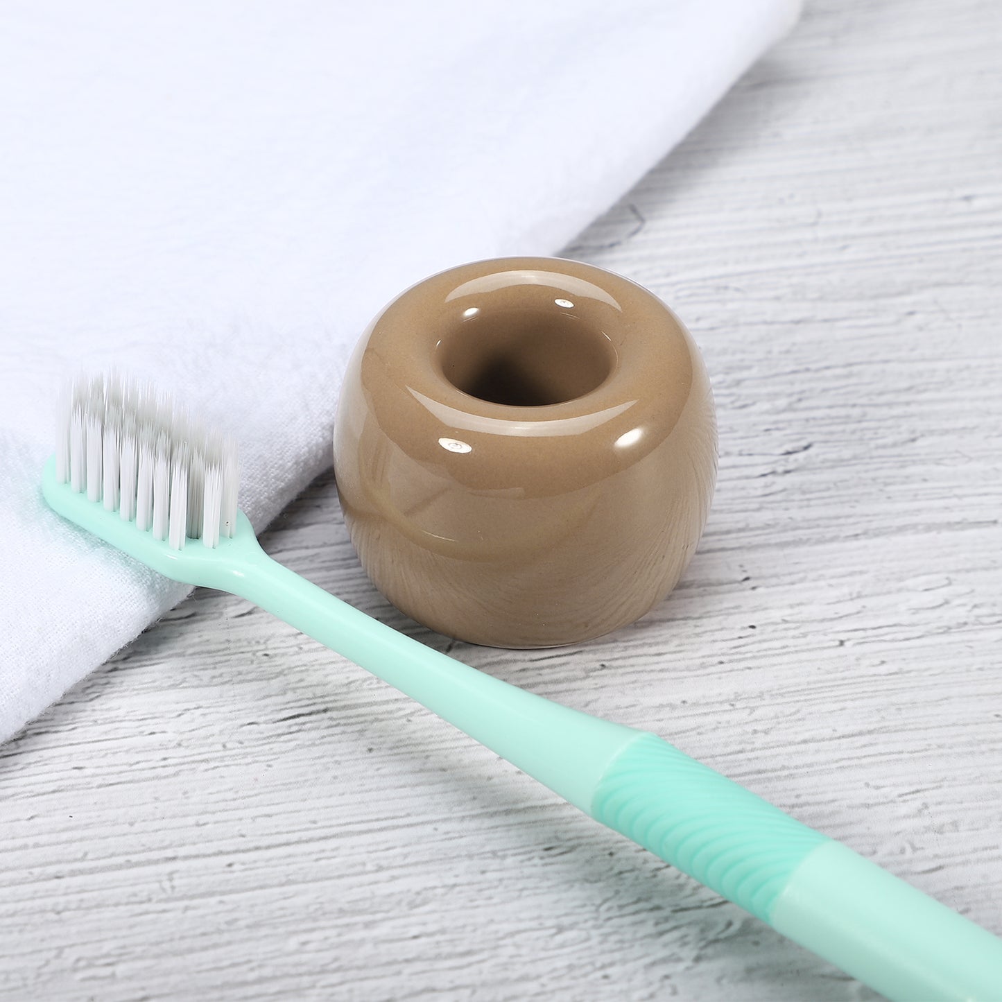 Mini portacepillos de dientes redondo de cerámica para baño, 4,25 x 3 cm, color marrón